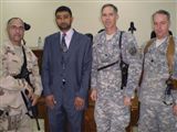 Attorneys pose for a photo during a recess at an Iraqi court.