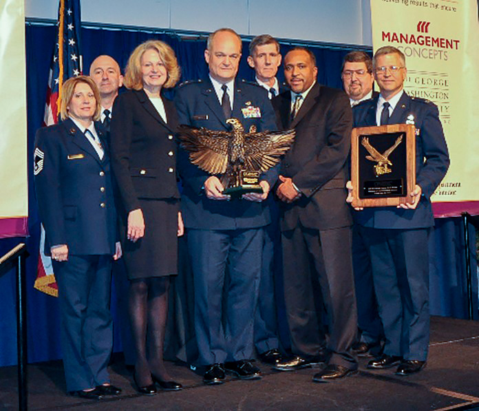 Members of the JAG Corps receiving the 2009 W. Edward Deming Outstanding Training Award 